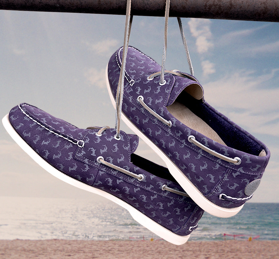 purple boat shoes dangle