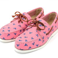 pink boat shoes pair